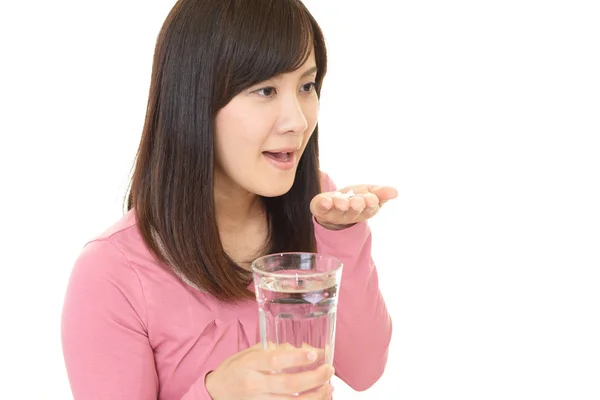 Woman with supplements — Stock Photo, Image