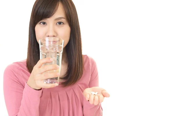 Woman with supplements — Stock Photo, Image