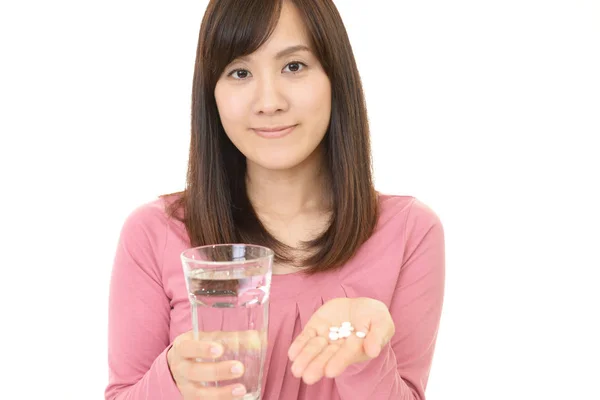 Woman with supplements — Stock Photo, Image