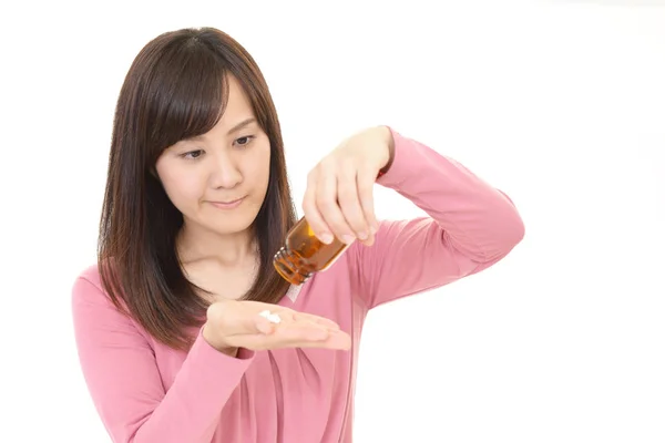 Woman with supplements — Stock Photo, Image