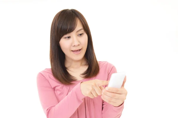 Woman with a smart phone — Stock Photo, Image