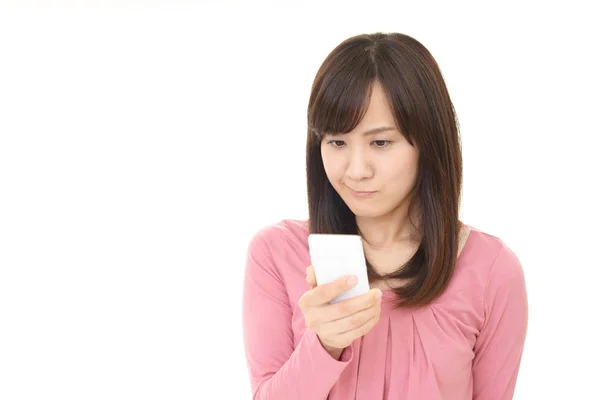 Woman with a smart phone — Stock Photo, Image