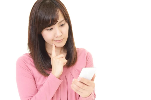 Woman with a smart phone — Stock Photo, Image