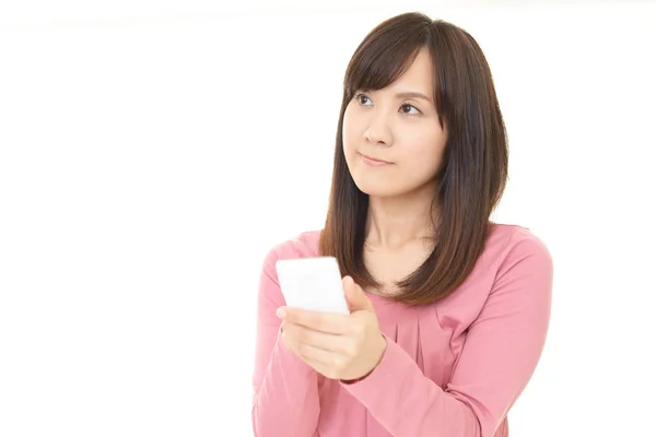 Woman with a smart phone — Stock Photo, Image