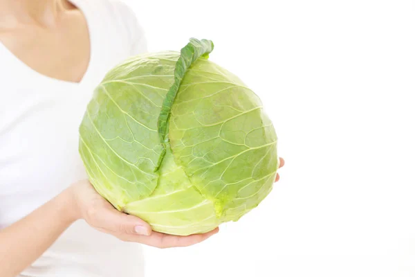 Donna che tiene verdura — Foto Stock
