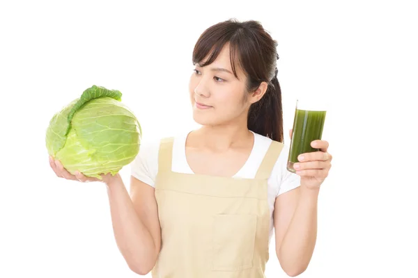 Frau mit Gemüse — Stockfoto