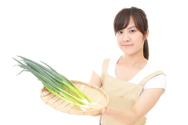 Frau mit Gemüse — Stockfoto