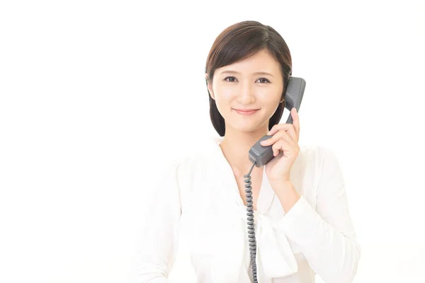 Mulher com um telefone — Fotografia de Stock