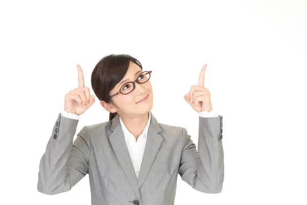 Asian woman pointing — Stock Photo, Image