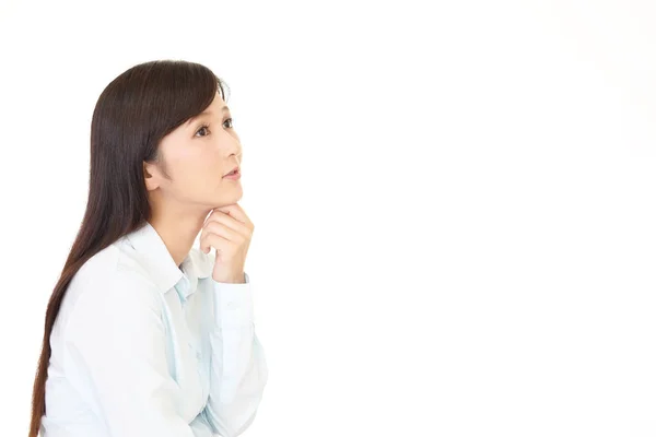 Uneasy Asian woman — Stock Photo, Image