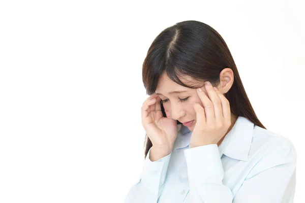 Mujer que tiene dolor de cabeza —  Fotos de Stock