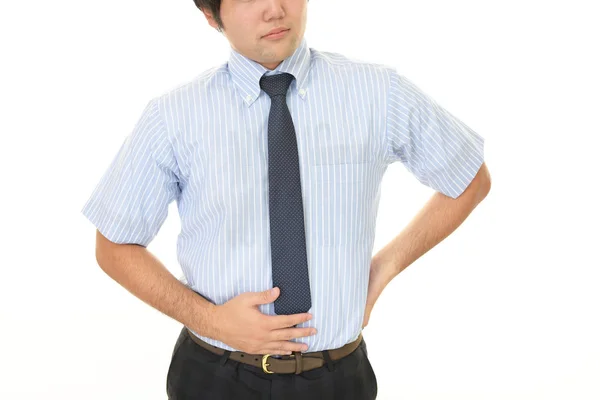 Człowiek, który ma bóle brzucha — Zdjęcie stockowe