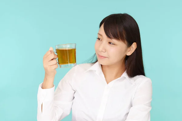 Woman drinking tea — Stock Photo, Image