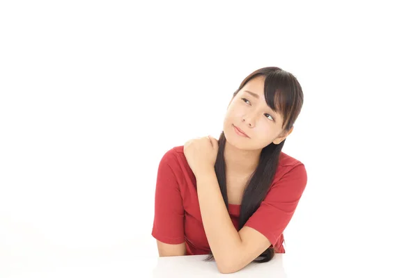 Woman who has a shoulder pain — Stock Photo, Image