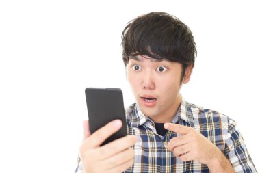 Şaşırmış Asyalı adam