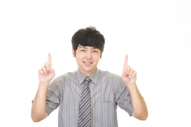 yukarı doğru işaret eden işadamı