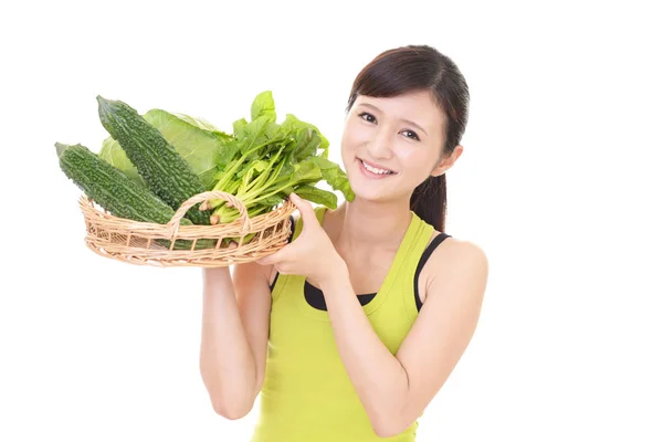 Kobieta warzyw gospodarstwa — Zdjęcie stockowe