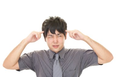 baş ağrısı olan işadamı 