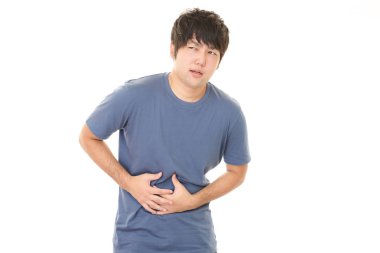 Bir mide ağrısı olan adam