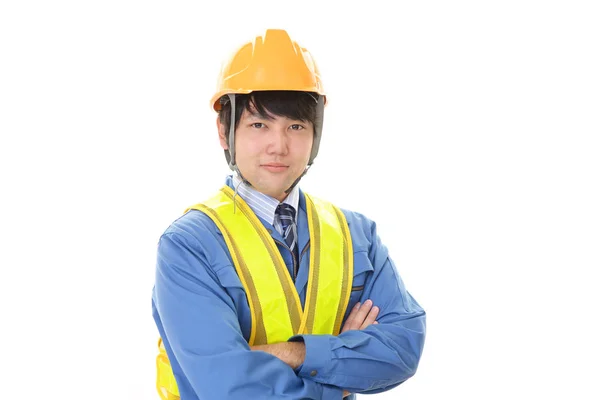 Lächelnder asiatischer Arbeiter — Stockfoto