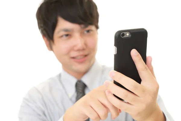 Geschäftsmann mit Smartphone — Stockfoto