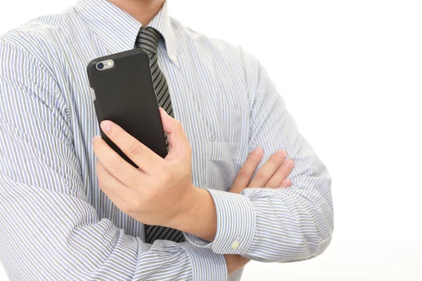 Businessman with a smart phone — Stock Photo, Image
