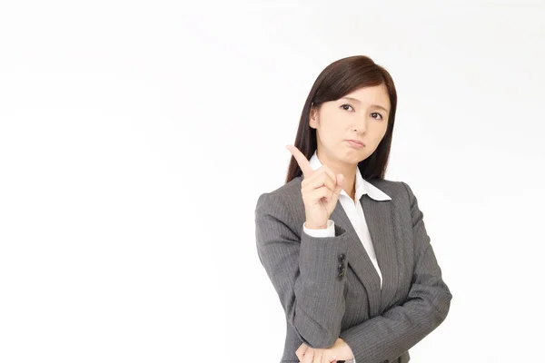 Dissatisfied Asian business woman — Stock Photo, Image