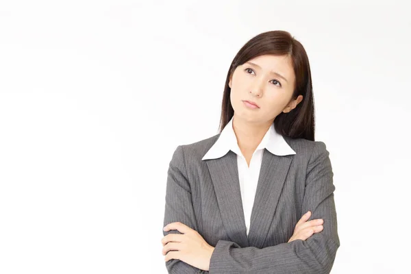 Tired Asian business woman — Stockfoto