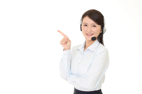 Operador de call center sorridente — Fotografia de Stock