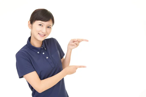 Mujer asiática señalando —  Fotos de Stock
