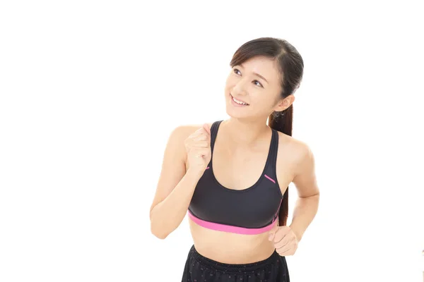 Beautiful woman works out — Stock Photo, Image