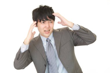 sinirli Asya işadamı