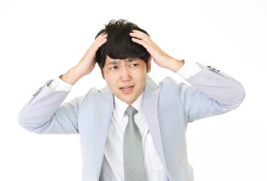 sinirli Asya işadamı