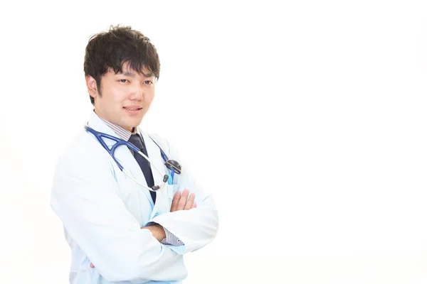 Smiling Asian medical doctor — Stock Photo, Image