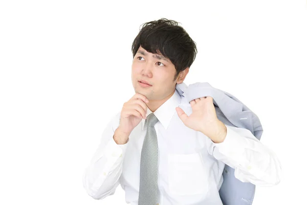 Uneasy Asian businessman — Stock Photo, Image