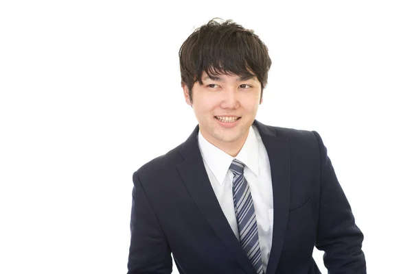 Lächelnder asiatischer Geschäftsmann — Stockfoto