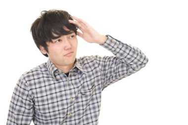 Huzursuz Asyalı adam