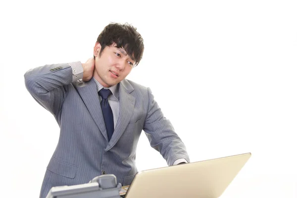 Tired Asian businessman — Stock Photo, Image