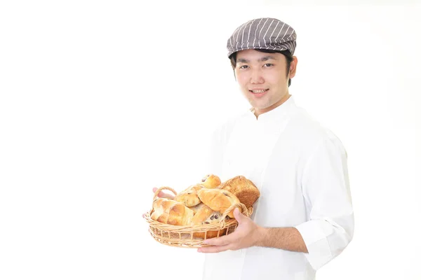 Lächelnder asiatischer Bäcker — Stockfoto