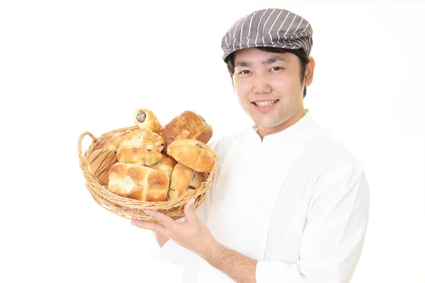 Sorridente panettiere asiatico — Foto Stock