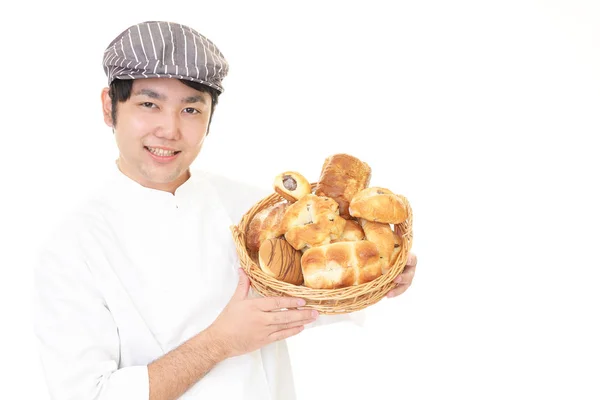 Sorridente panettiere asiatico — Foto Stock