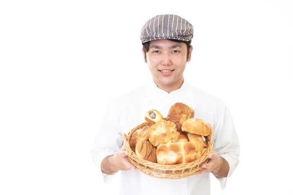 Sorridente panettiere asiatico — Foto Stock