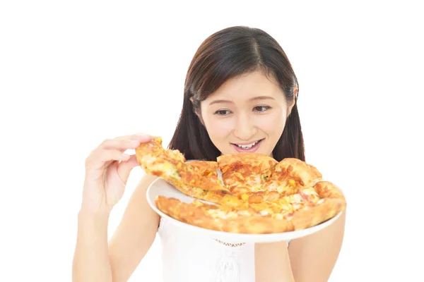 Mujer comiendo pizza — Foto de Stock