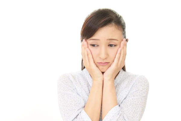 Tired Asian woman — Stock Photo, Image