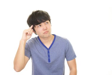 Huzursuz Asyalı adam