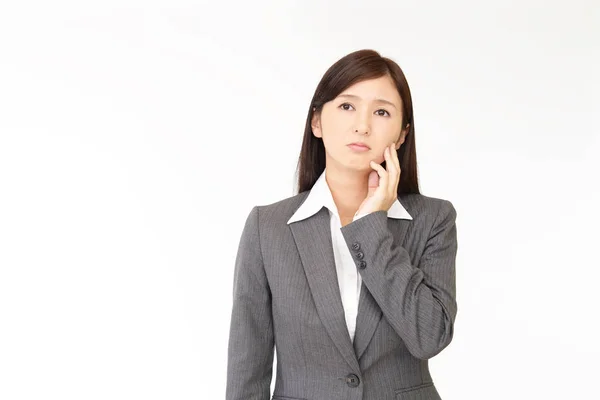 Unbehagen asiatische Geschäftsfrau — Stockfoto
