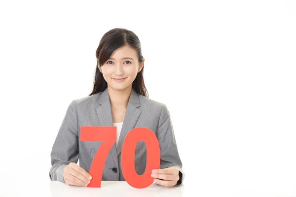 Woman with a number — Stock Photo, Image