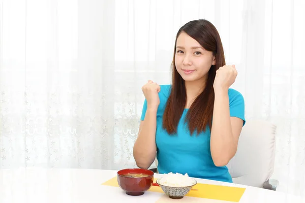 Woman having breakfast — Stock Photo, Image