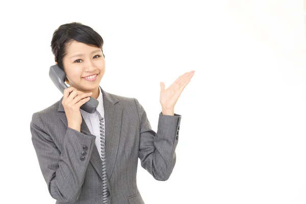 Business woman with a phone — Stock Photo, Image