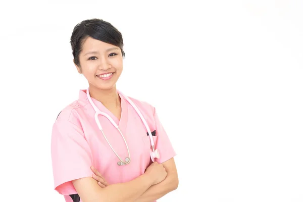 Sonriente asiático médico — Foto de Stock